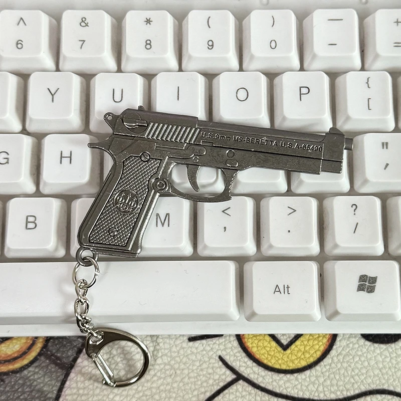 Фото Цельный брелок с пистолетом M1911 — прочная модель пистолета из сплава металла, креативная подвеска для рюкзака и аксессуары для ключей №4