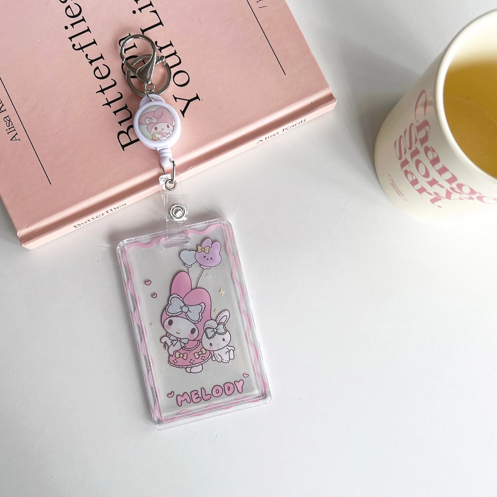 Фото Новые держатели для карт Sanrio My Melody Cartoo, прозрачный держатель для карт, брелок Cinnamoroll, автобусная карта, чехол для студенческих карт, защита для фото №5