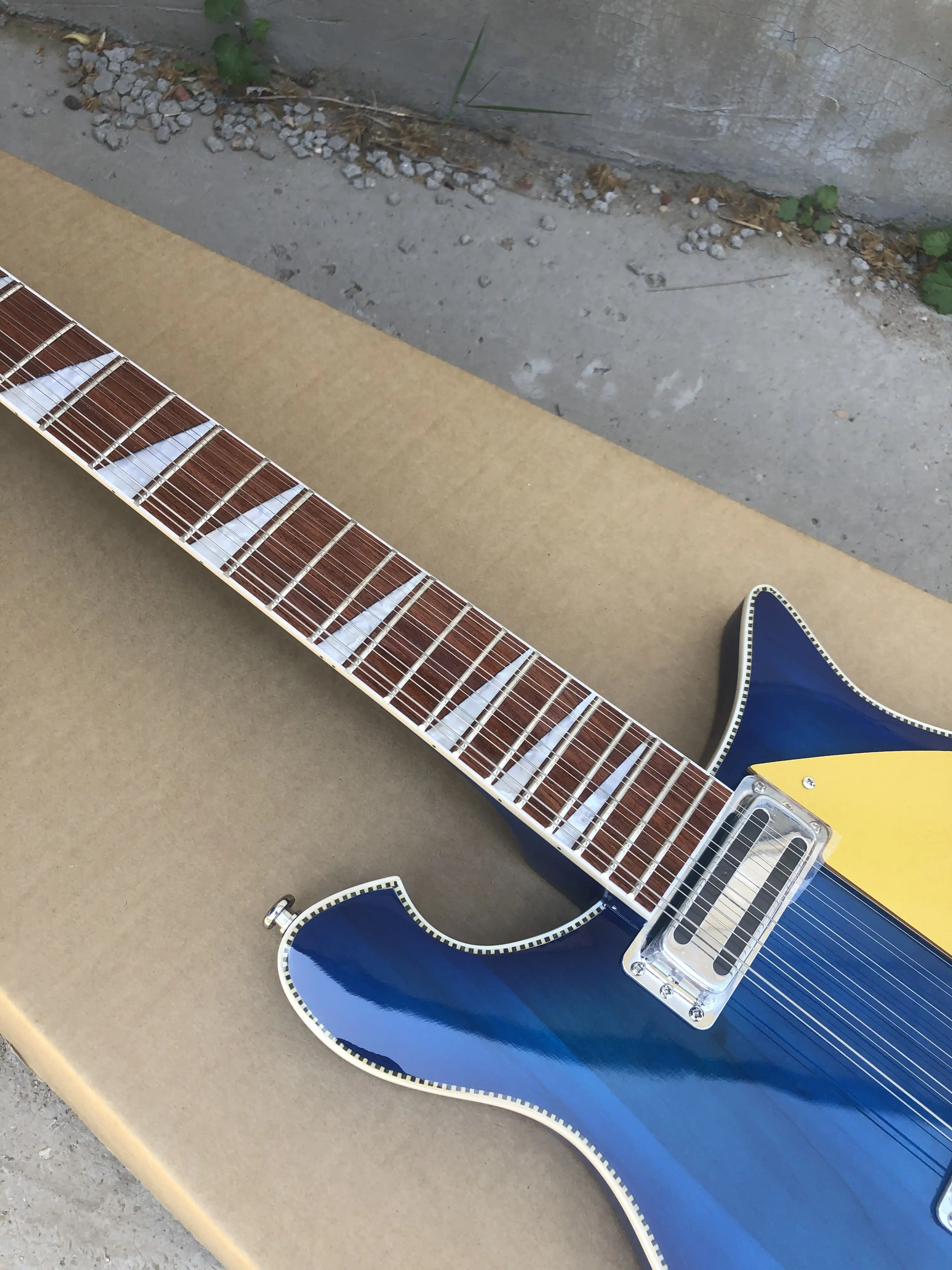 Фото Электрогитара Blue Ricken 660, гриф из розового дерева, большой вибрато, прозрачный гриф, шарнирное соединение R'Ta Stock №2