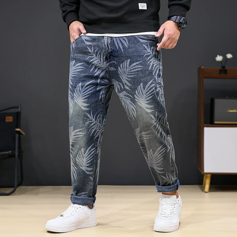 Фото 8XL oversized jeans men's fashion leaf printed trendy casual stretch denim plus sizes loose 150kg fat pants №3