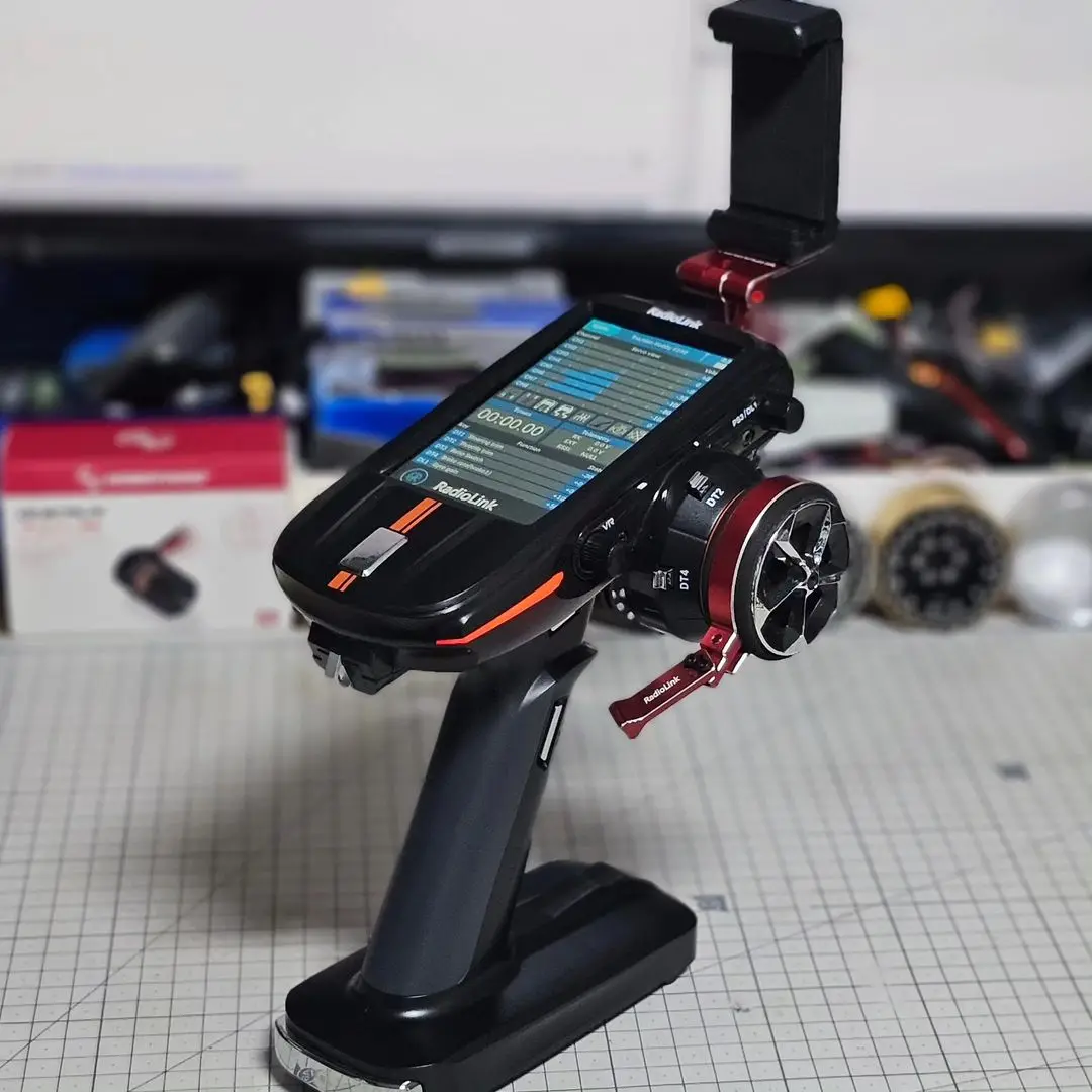 Фото Радиоуправляемый передатчик Radiolink RC8X 8CH 2,4G с гироскопом R8FG V2.1, аксессуар для управления одной рукой и держатель телефона для экрана FPV №2