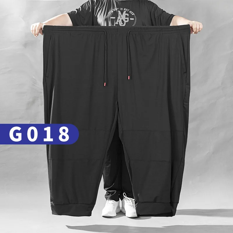 Фото Мужские большие брюки 250 кг, большие размеры 15XL 16XL, свободные эластичные брюки размера плюс 6, 60, 62, летние повседневные брюки из ледяного шелка, черные, для дома и отдыха №3