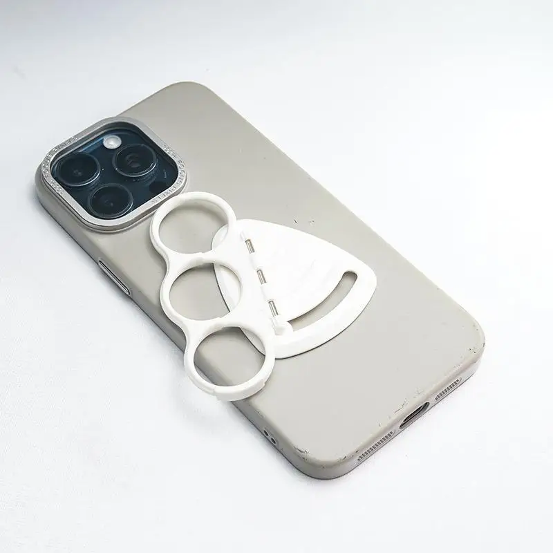 Фото Movable Foldable Finger Hole Mobile Phone Ring Buckle Stable Holder Phone Accessories №3